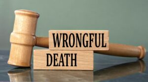 Wooden Gavel and cubic written wrongful death